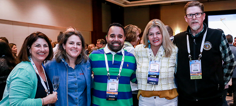 Group of conference attendees wearing name badges